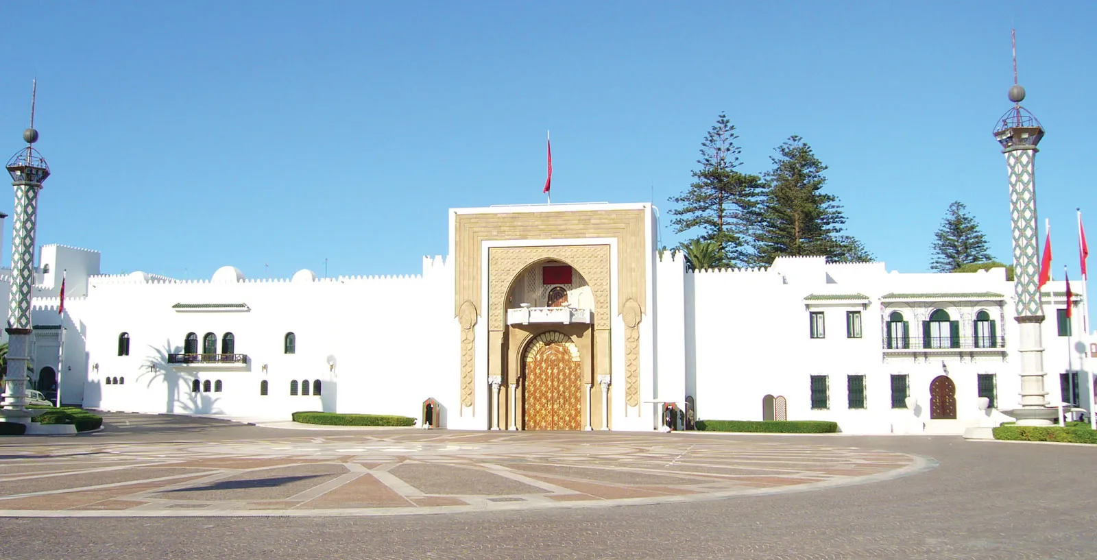 Exterior view of Tetouan's Royal Palace, showcasing its grand architecture and ornate details.