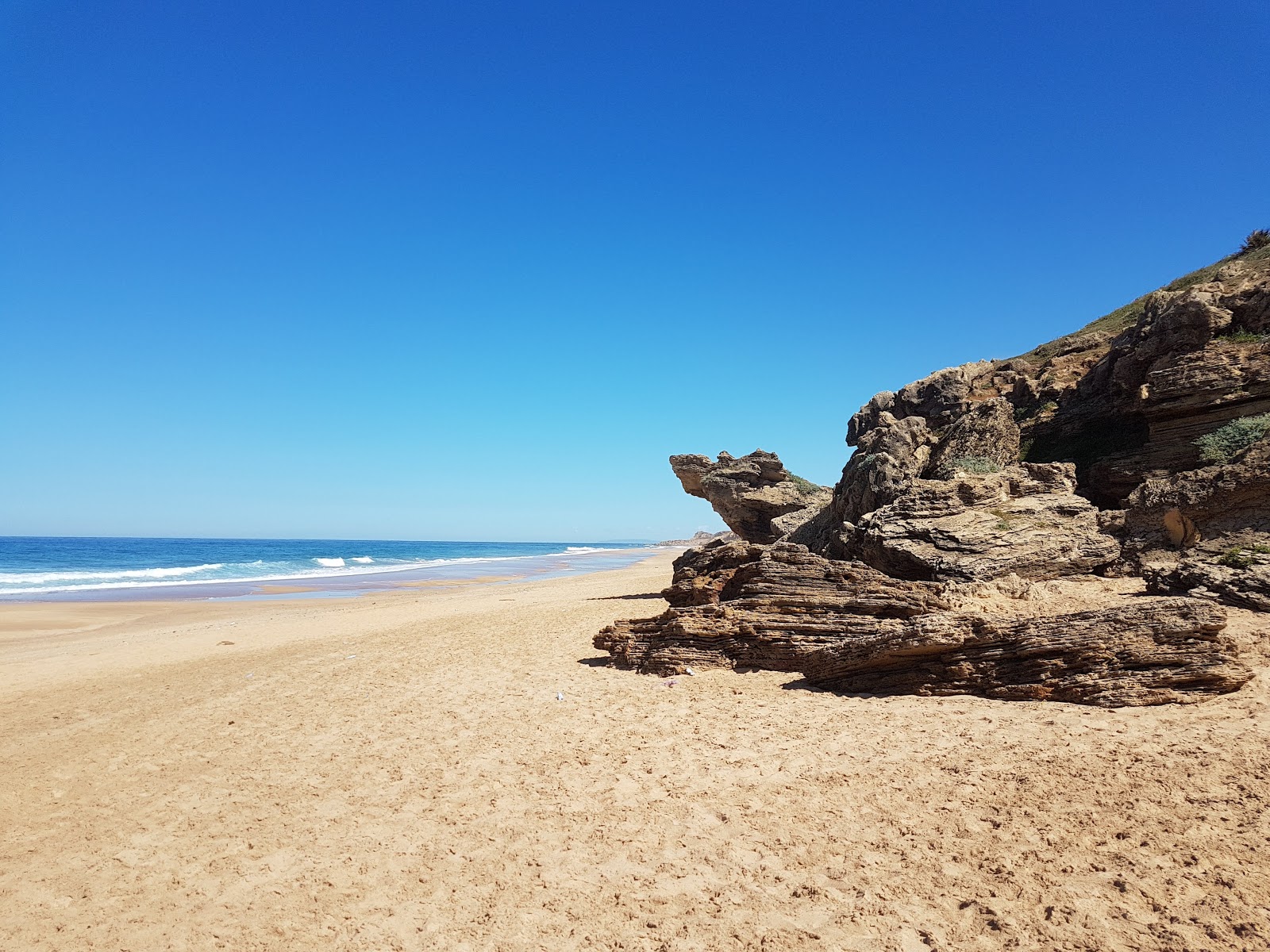 Golden sands and azure waters.