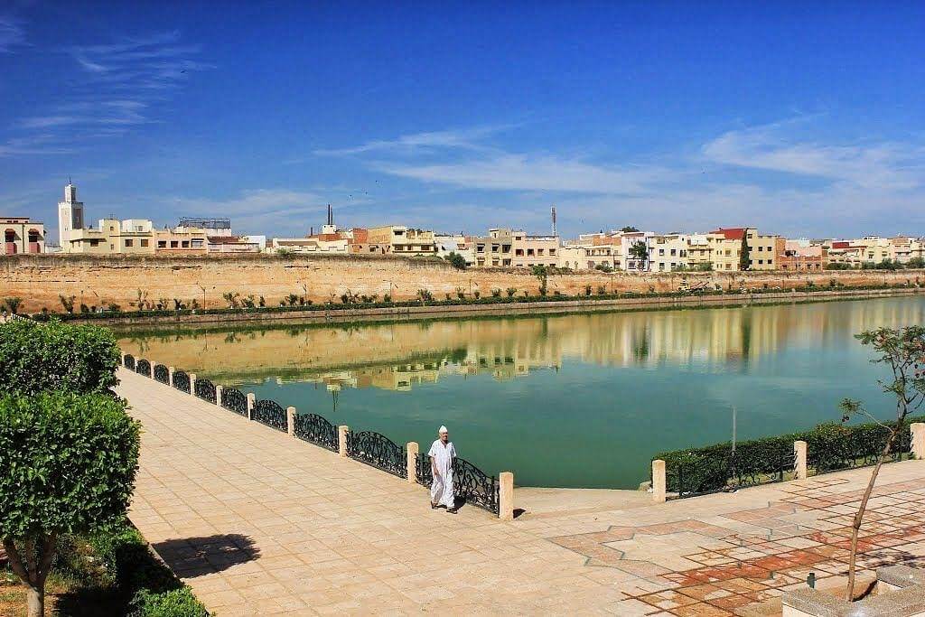 A tranquil waters, lush greenery, and historical significance.